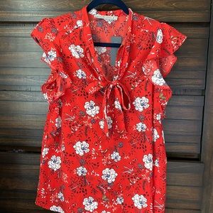 Red floral blouse